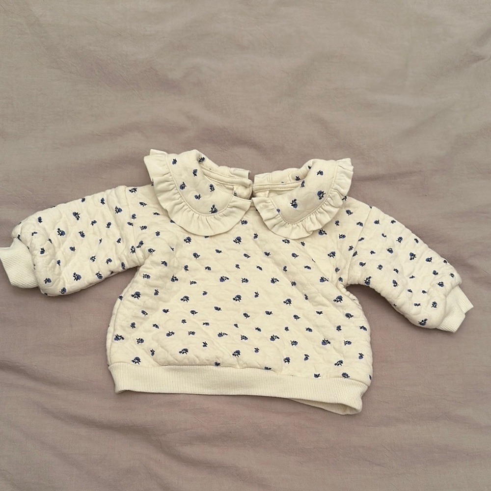 Cream Baby Sweater with Blue Floral Pattern